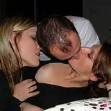 Kissing porn pictures - boyfriend and girlfriend kiss another girl.
