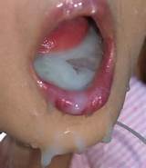 Mouth full of cum