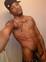 Black thug guy naked and showing the cock.