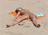 ... , nude milf on the beach, bald pussy, legs spread, nude beach voyeur