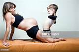 title pregnant mother and son caption mom with pregnant belly is ...