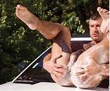 Gay porn star Adam Killian takes part in the most erotic car wash ...