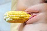 Gorgeous babe with sexy legs toying her hot pussy with corn cob