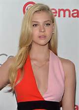 Nicola Peltz - Nicola Peltz braless wearing low cut mini dress at the ...